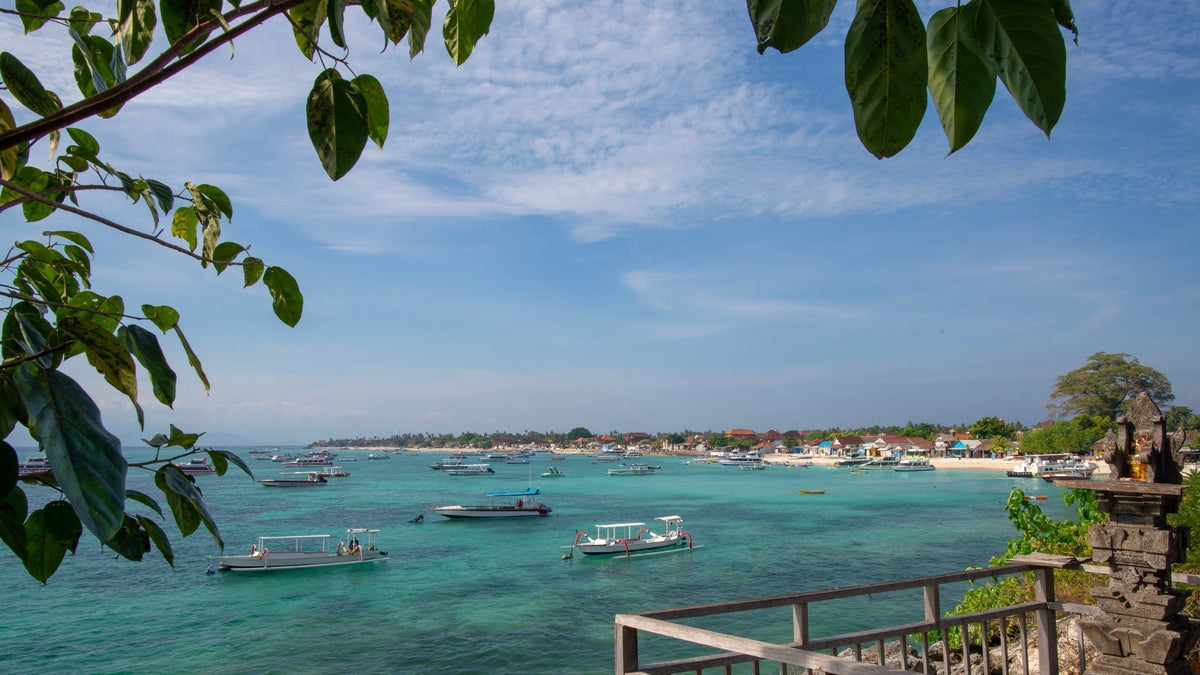 The serene landscape of Jungut Batu Beach from the boardwalk on the hillside over looking the crystal clear water.