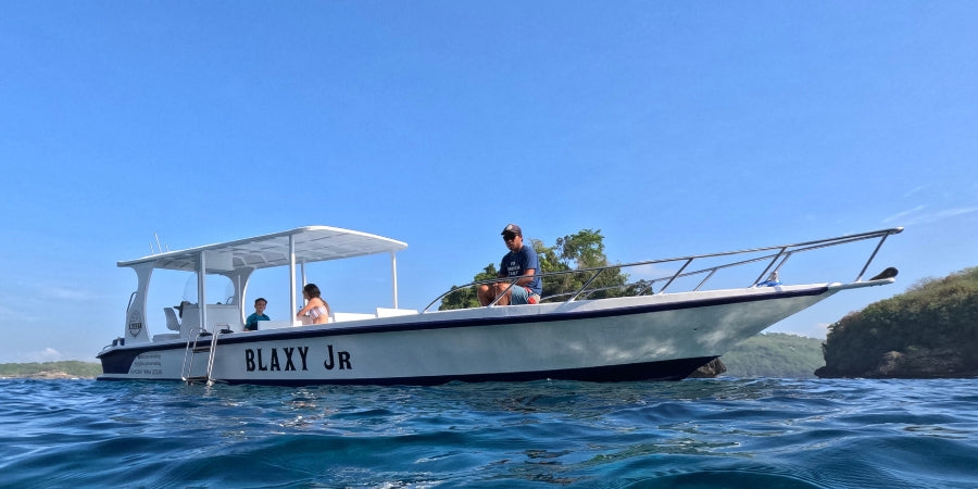 Snorkelling Boat named 'BLAXY JR' on the water with a clear blue sky