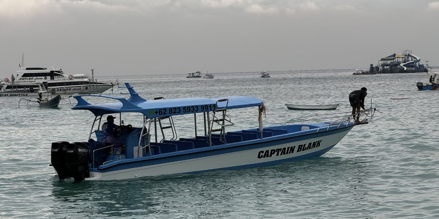 Snorkelling Boat named 'Captain Blank' on the water of Jungut Batu