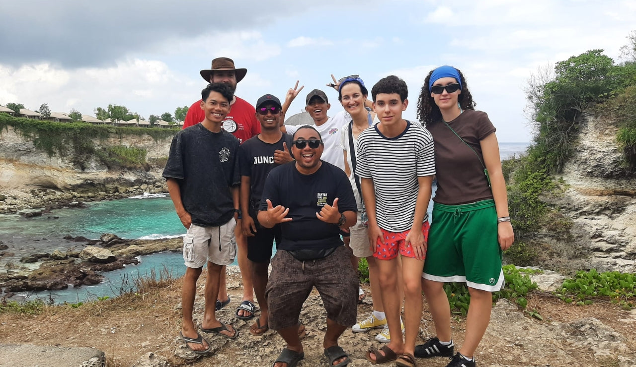 Tour Operator with tour group at dream Beach - Island Pulse