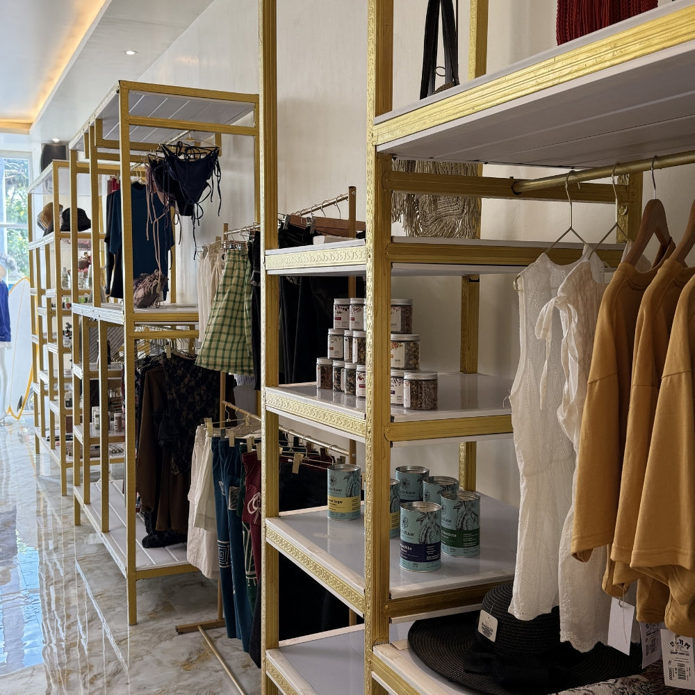Clothing store interior of Island Look, with racks and shelves displaying various garments, Nusa Lembongan