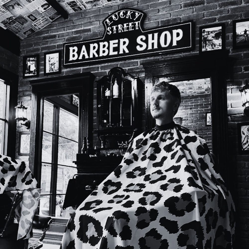 A customer waiting for a hair cut at Lukcy Street Barber Shop, Nusa Lembongan