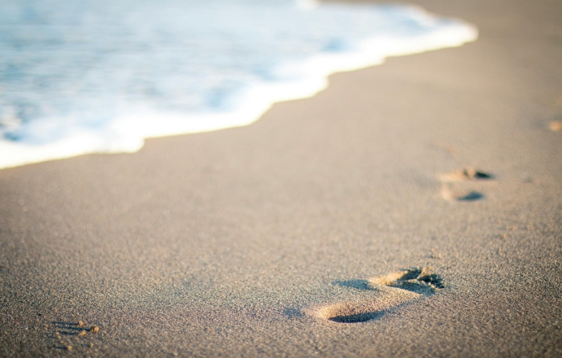 Footprints on the sand on Jungut Batu Beach, Nusa Lembongan